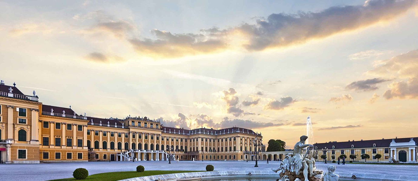 Front of the Schoenbrunn Palace in Vienna at sunset - Austria.
The Palace is a former imperial summer residence and one of the most important cultural monuments and major tourist attractions in the country.
