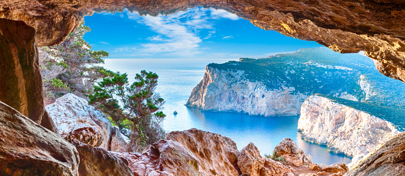 Landscape of the gulf of capo caccia in a sunny and cloudy day - Sardinia